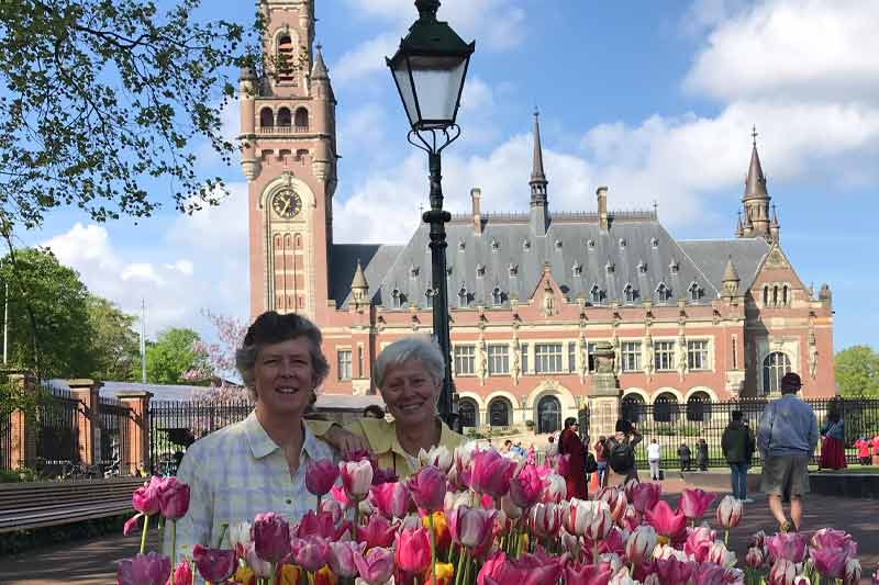 Godwin and Holt in front of the Peace Palace