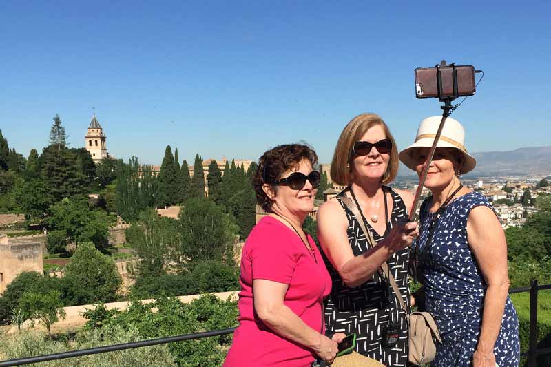 three women posing for a selfie in Spain