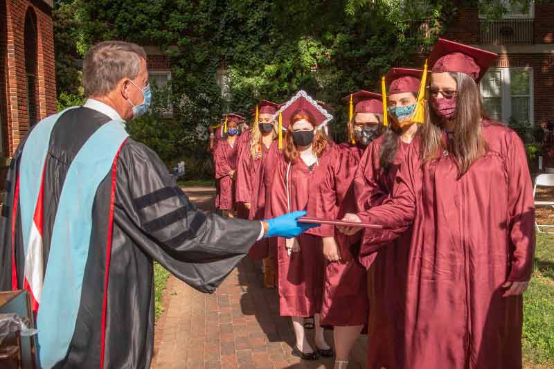 Students receiving diplomas