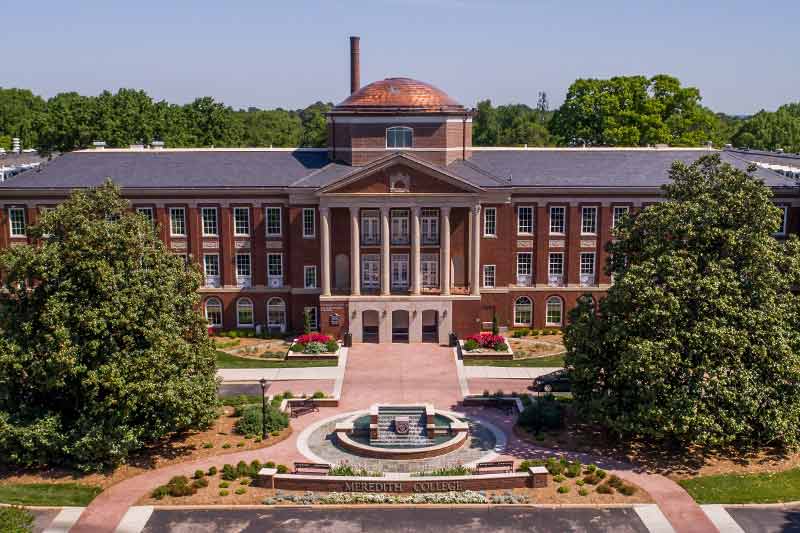 Front view of Johnson Hall and the fountain.