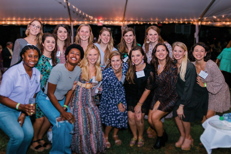 Alumnae posing for a group photo.