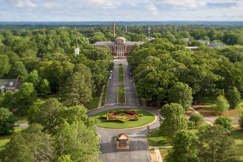 An aerial view of the drive down main campus to Johnson Hall.