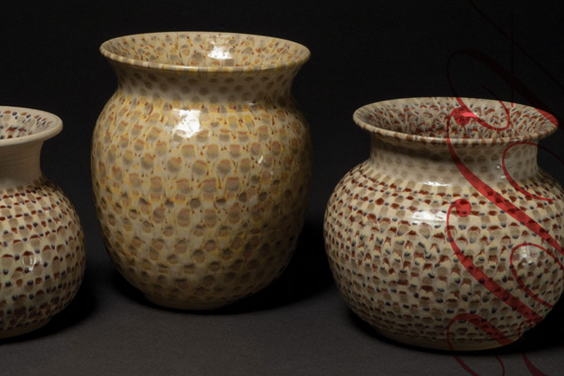 Three pottery vases.